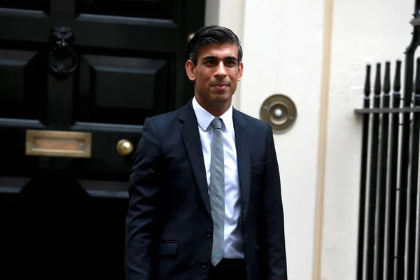 LONDON, UNITED KINGDOM - Oct 27, 2021: Chancellor of the Exchequer, Rishi Sunak leaves Downing Street in central London after attending the weekly Cabinet meeting in London, England
