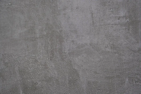 背景にグレーのグランジ石膏スタッココンクリート壁のテクスチャのクローズアップショット — ストック写真