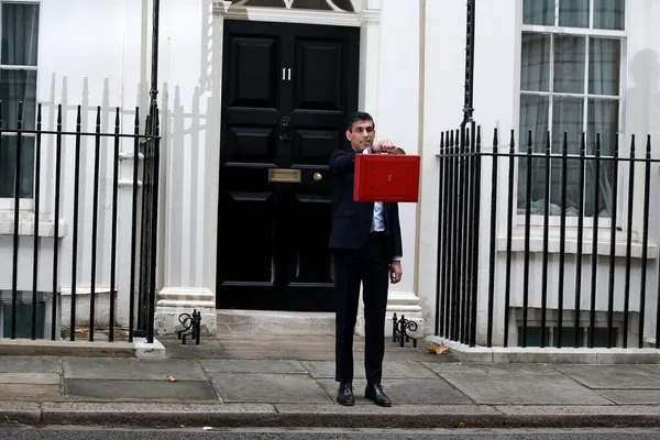 LONDON, UNITED KINGDOM - Oct 27, 2021: Chancellor of the Exchequer, Rishi Sunak leaves Downing Street in central London after attending the weekly Cabinet meeting in London, England