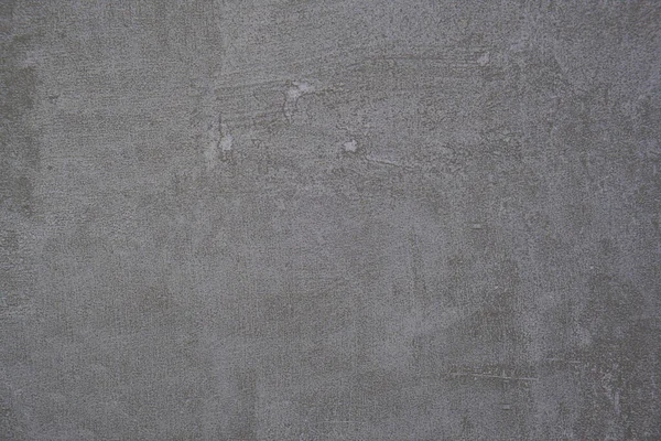 背景にグレーのグランジ石膏スタッココンクリート壁のテクスチャのクローズアップショット — ストック写真