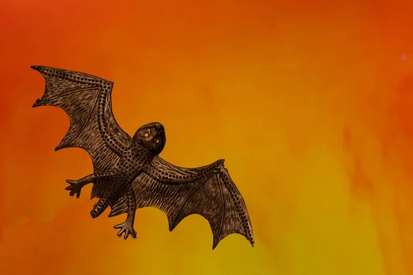 Closeup Spooky Bat Toy Bright Orange Background Halloween — Φωτογραφία Αρχείου