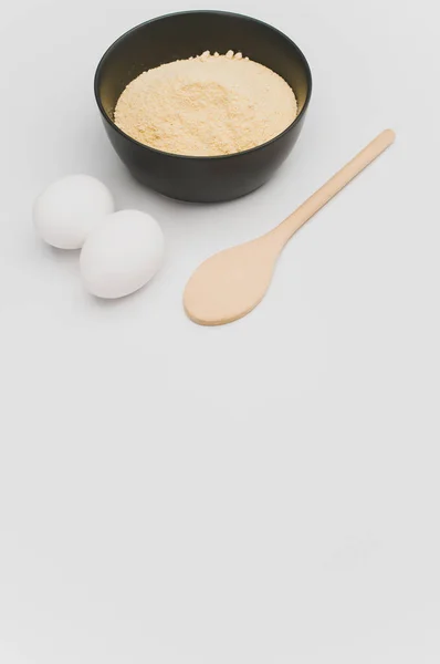 Wooden Spoon White Eggs Dark Gray Bowl Wholegrain Flour White — Stock Photo, Image