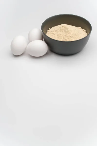 White Eggs Dark Gray Bowl Wholegrain Flour White Background Copy — Stock Photo, Image