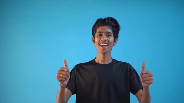 Indian Man Showing Thumbs Isolated Blue Background — ストック動画