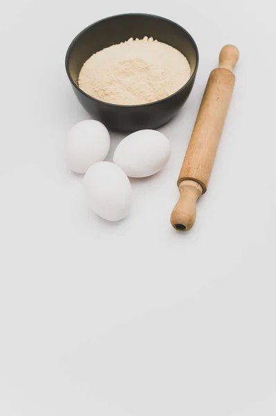 Wooden Rolling Pin White Eggs Dark Gray Bowl Wholegrain Flour — Stock Photo, Image