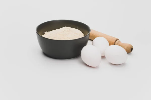 Wooden Rolling Pin White Eggs Dark Gray Bowl Wholegrain Flour — Stock Photo, Image