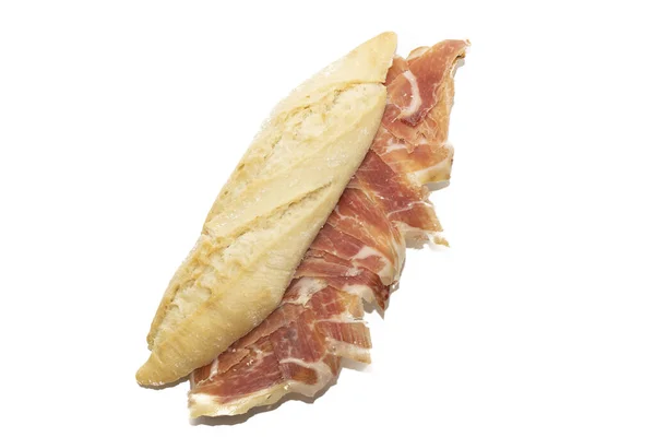 Eine Nahaufnahme Eines Spanischen Schinkensandwich Mit Knusprigem Brot Isoliert Auf — Stockfoto