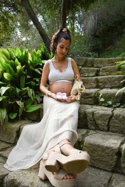 Mid Low Angle Shot Beautiful Caucasian Woman Holding Baby Shoes — Stock Photo, Image