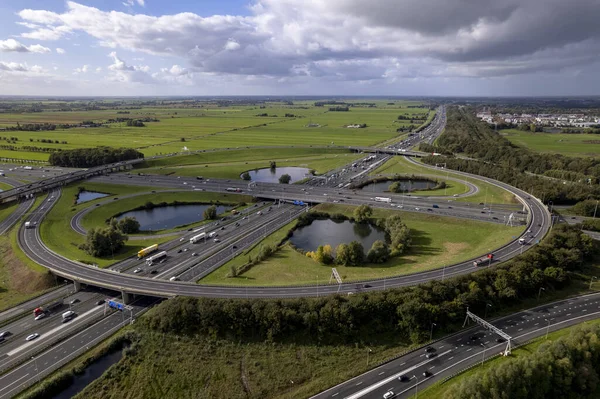 Vista Aérea Intersección Tráfico Oudenrijn Paisaje Holandés Con Nubes Dramáticas —  Fotos de Stock