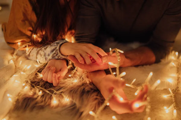 Christmas Lights Hands Beautiful Couple — Stock Photo, Image