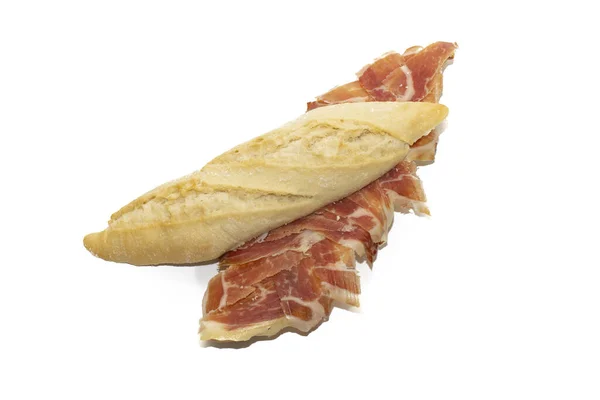 一种传统的西班牙波卡迪略火腿三明治 带有硬面包 背景是白色的 — 图库照片