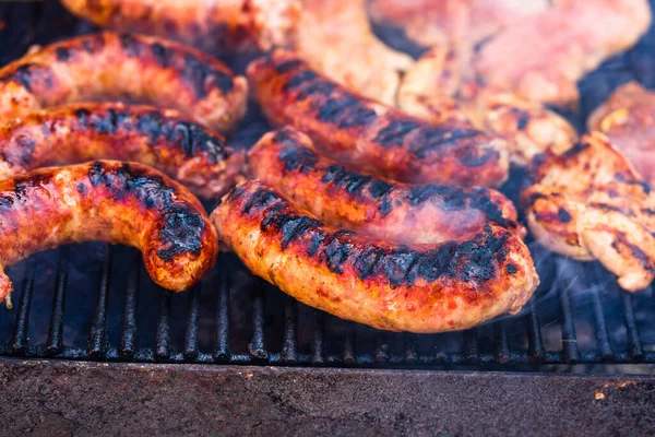 Closeup Shot Grilling Sausages Pork Chops Barbecue Grill — Stock Photo, Image