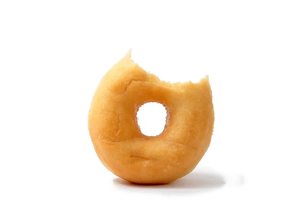Beyaz Arka Planda Bir Donut Isırığının Yakın Çekimi — Stok fotoğraf