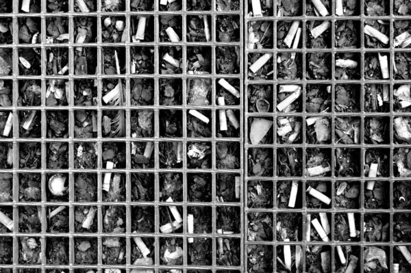 Grayscale Photo Lot Used Pressed Cigarettes Square Grid — Stock Photo, Image