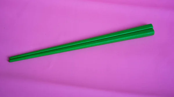 Närbild Bild Gröna Ätpinnar Rosa Bakgrund — Stockfoto