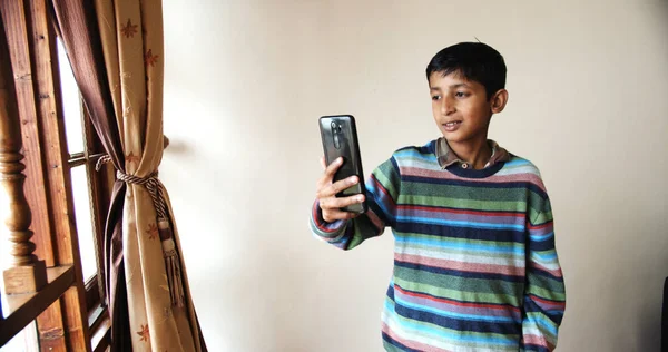 Closeup South Asian Young Boy Colorful Striped Pullover Playing Phone — Foto de Stock