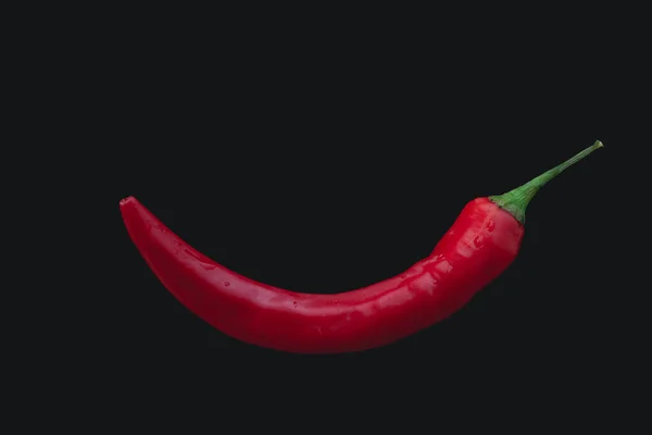 Pepperoni Pod Black Background — Stockfoto