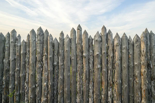 Wooden Palisade Made Logs Sharp Stakes Ground — Stock Photo, Image