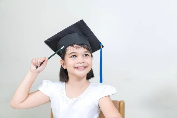 Portrait Cheerful Asian Little Girl Wearing Mortarboard Isolated White Background — Stock Photo, Image