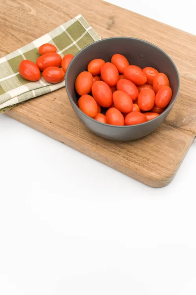 Dark Gray Bowl Full Datterini Tomatoes Chopping Board Table Napkin — Zdjęcie stockowe