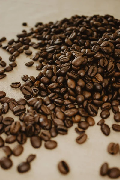 Vertical Shot Coffee Beans Isolated Beige Fabric Background — Stock Photo, Image