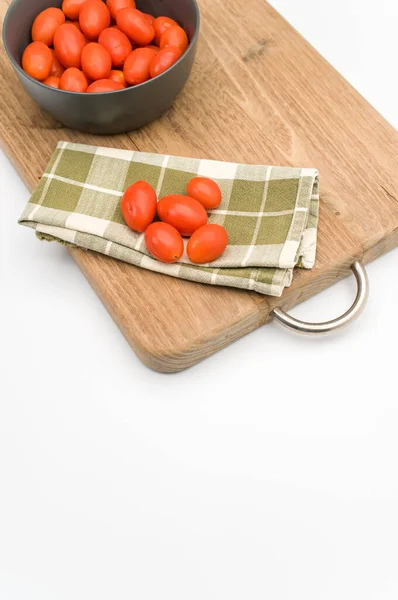 Dark Gray Bowl Full Datterini Tomatoes Chopping Board Table Napkin — стоковое фото