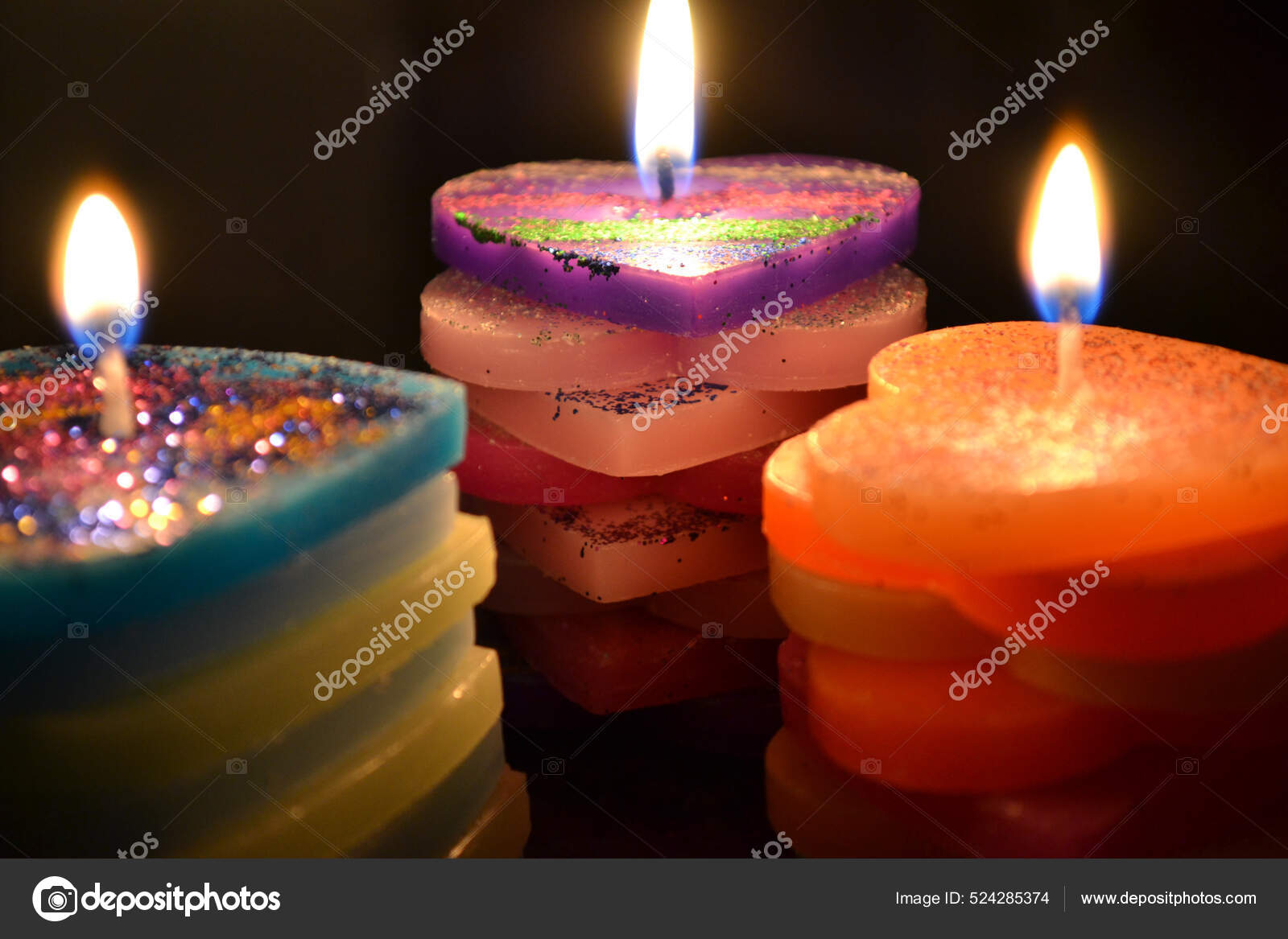 Close Shot Three Beautiful Colourful Heart Shaped Candles Glitter Stock  Photo by ©Wirestock 524285374