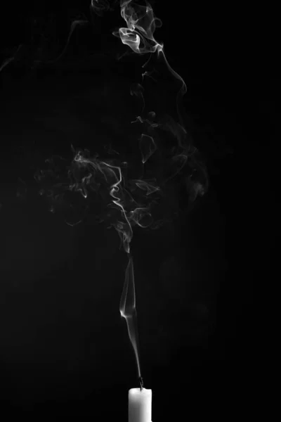 Vertical Shot Smoke Extinguished Candle Isolated Black Background — Stockfoto