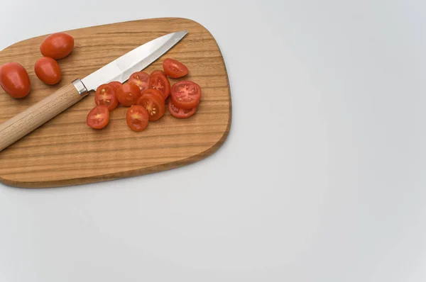 Datterini Tomatoes Chopping Board Knife White Surface Text Space — Stock Photo, Image