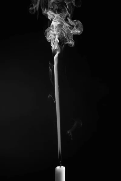 Vertical Shot Smoke Extinguished Candle Isolated Black Background — стоковое фото