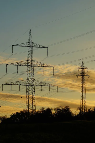 Siluetas Torres Alta Tensión Atardecer Frankfurt Alemania —  Fotos de Stock