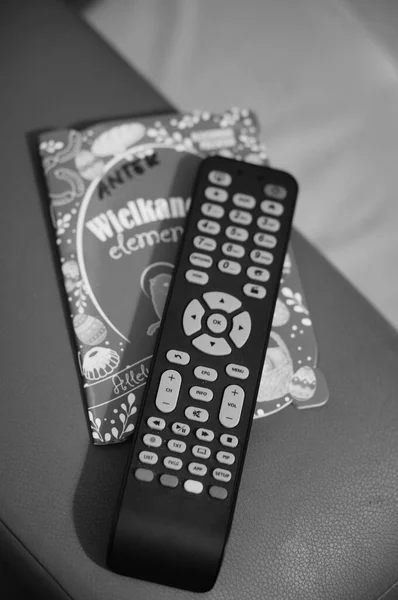 Poznan Poland Mar 2018 Top View Television Remote Small Book — Stock Photo, Image