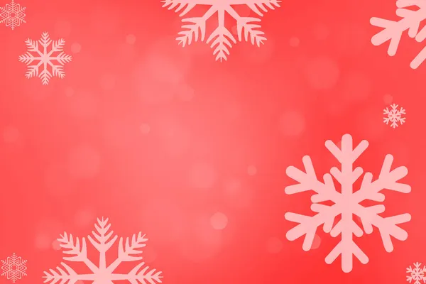 雪の結晶が赤いボケを背景にしたクリスマスの絵葉書 — ストック写真