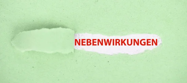 Λέξη Παρενέργειες Στέκεται Ένα Πράσινο Χρώμα Φόντο Γερμανική Γλώσσα Σκισμένο — Φωτογραφία Αρχείου