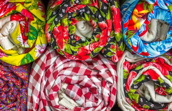 Closeup Vibrant Colored Fabrics Rolled Shelves Store — Stockfoto