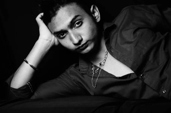 Grayscale Shot Stylish Young Man Wearing Jewelry Jewelry Posing Dark — Stock Photo, Image