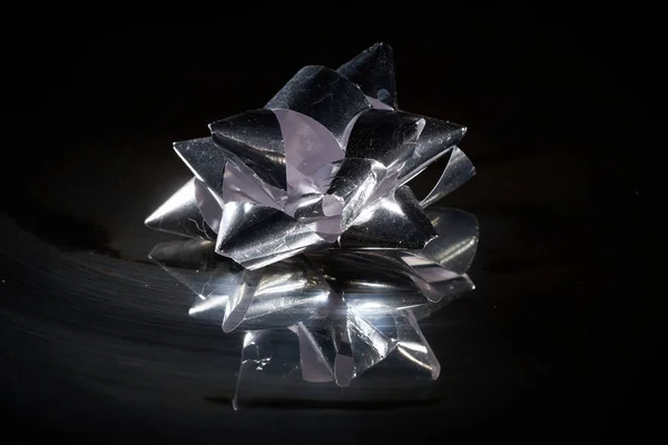 Silver Bow Reflecting Mirror Isolated Dark Background — Foto de Stock