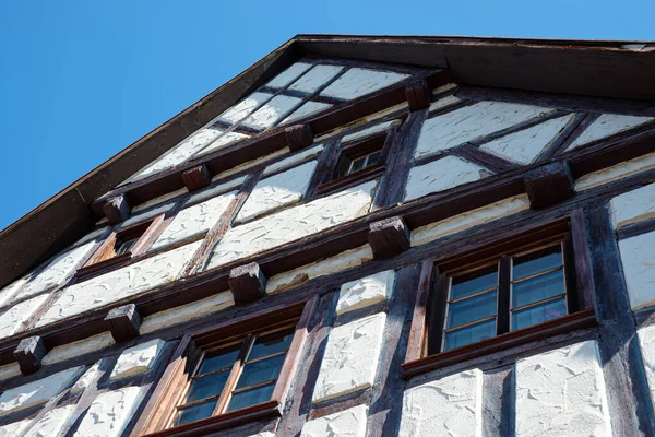 Low Angle House Wooden Half Timbered Windows Blue Sky — Stock Fotó