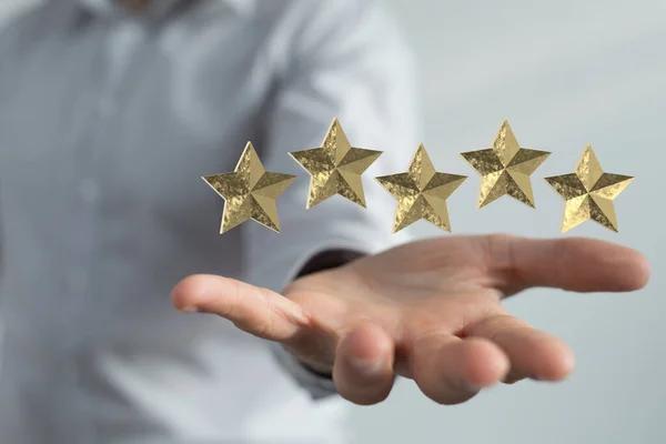 Male Hands Holding Illustrated Five Golden Review Stars — Foto Stock