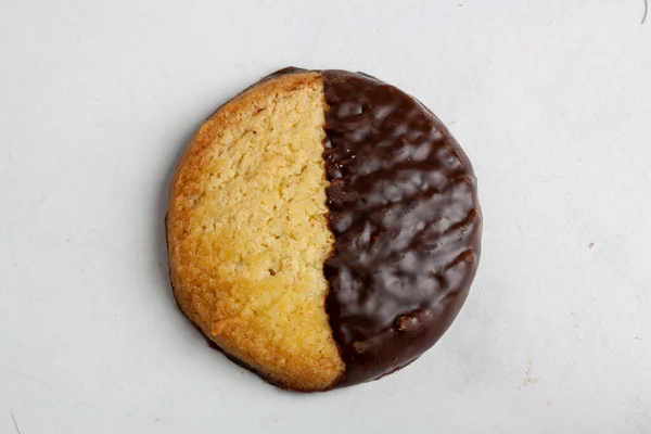 Closeup Delicious Vanilla Cookie Half Covered Chocolate — Foto de Stock