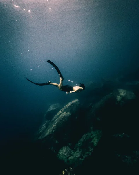 Person Diving Deep Mediterranean Sea — стоковое фото