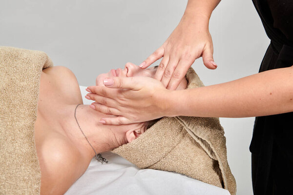 Professional Masseuse Massaging Her Female Client Royalty Free Stock Photos