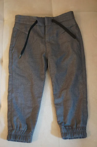 Top View Grey Colored Elastic Pants — Stockfoto