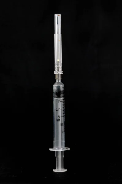 Vertical Shot Syringe Isolated Black Background — Stock Photo, Image
