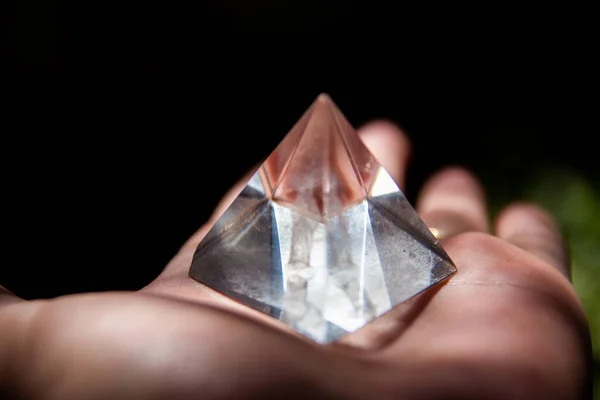 Closeup Crystal Pyramid Figurine Person Palm — Stok fotoğraf