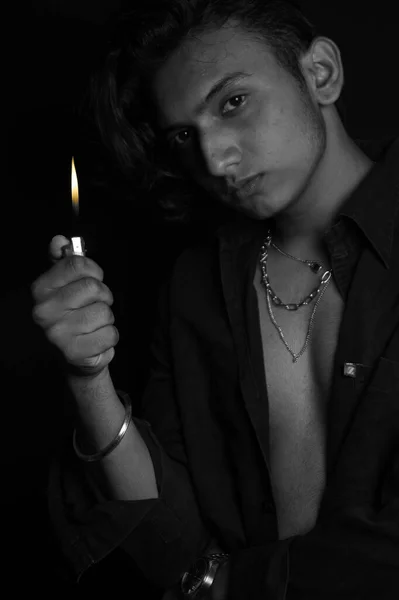 Grayscale Shot Stylish Young Man Wearing Jewelry Holding Lighter Posing — Stock Photo, Image