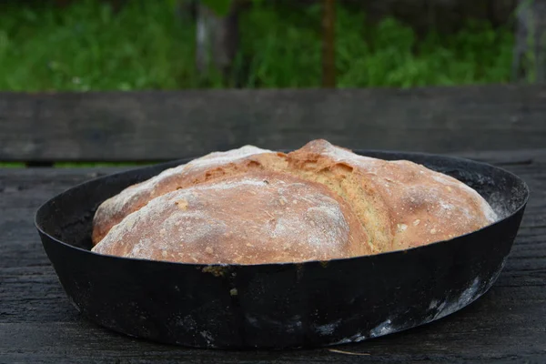 Selective Focus Shot Freshly Backed Bread Pan Wooden Surface — ストック写真