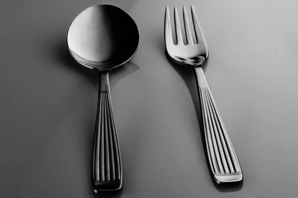 Closeup Shot Spoon Fork Gray Background — Stockfoto