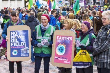NEWCASTLE, UNITED KINGDOM - Nov 06, 2021: Newcastle, UK - Saturday 6th November 2021: Ladies with placards rallying outside Newcastle Civic Centre over global climate change . clipart