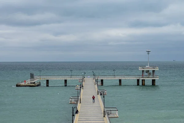 Dock Calm Sea Cloudy Sky — стоковое фото